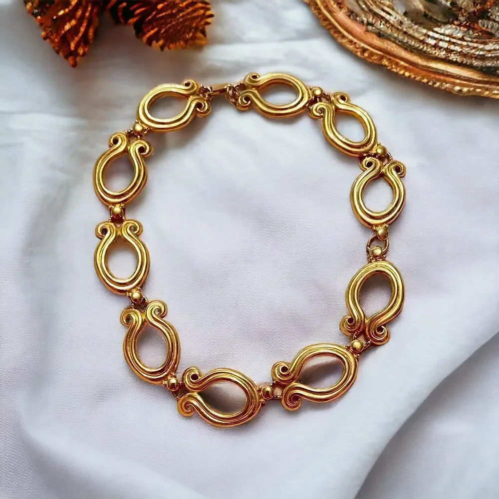 Swirly Gold Tone Statement Necklace